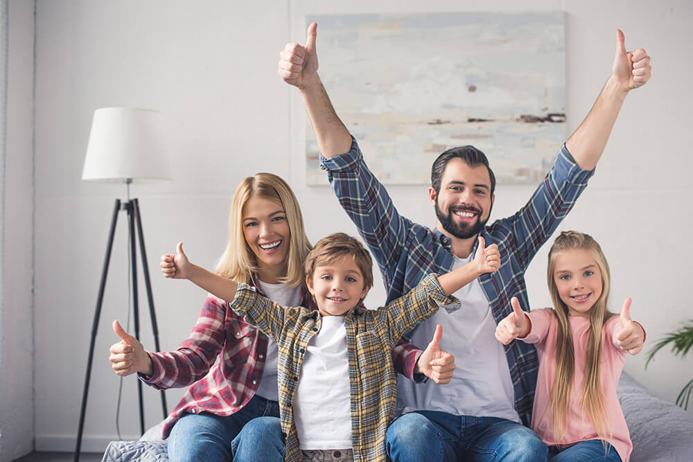 Photo of a happy family in a comfortable home